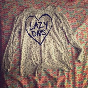 Open shoulder, knot at bottom of shirt,Long sleeve